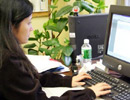 Woman using computer on Columbia's Health Sciences Campus